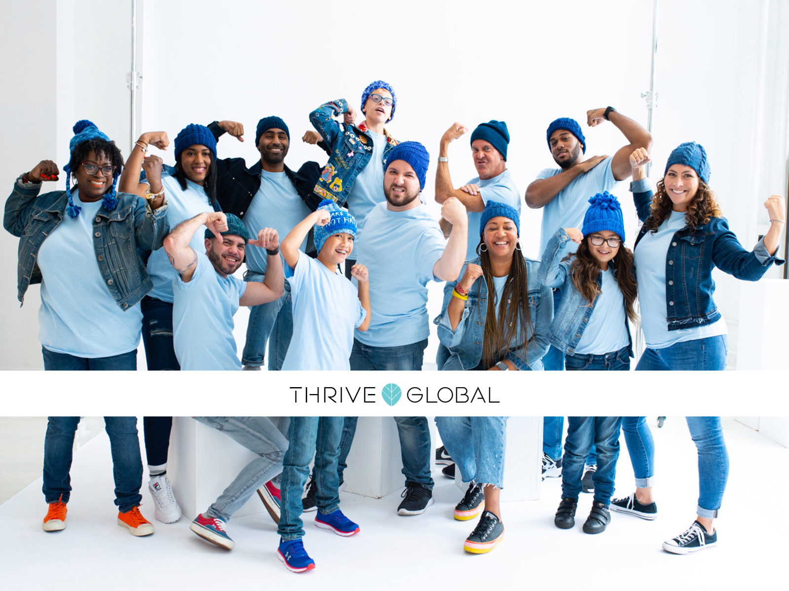 Thrive Global logo overlaid on image of Shira and friends in blue hats