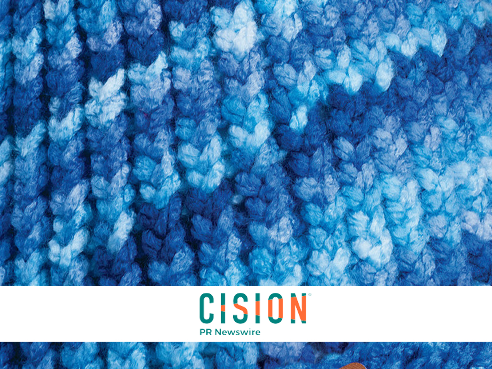 Cision pr newswire logo overlaid on image of woven blue yarn