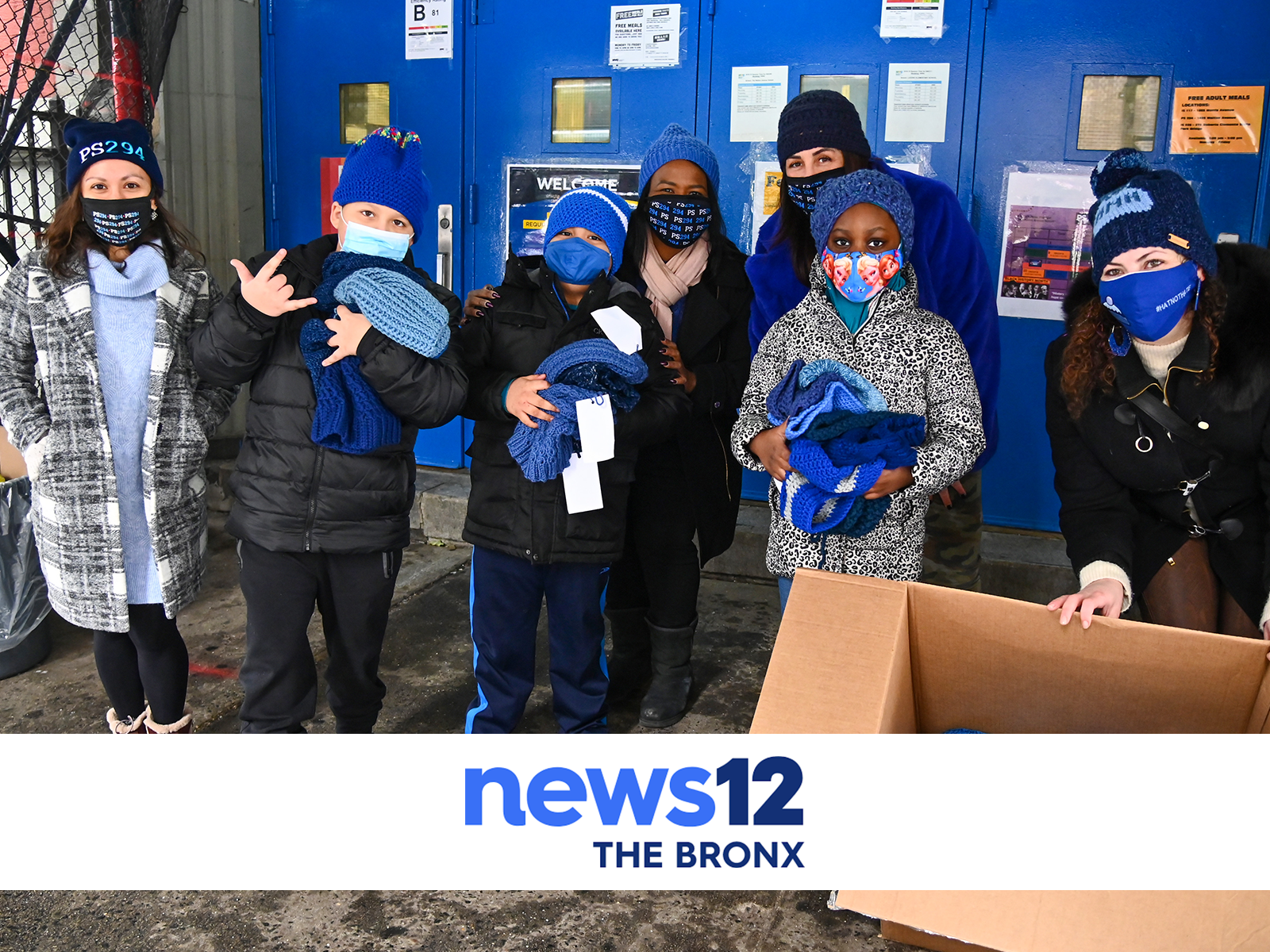 News12 Bronx still frame of students in blue hats
